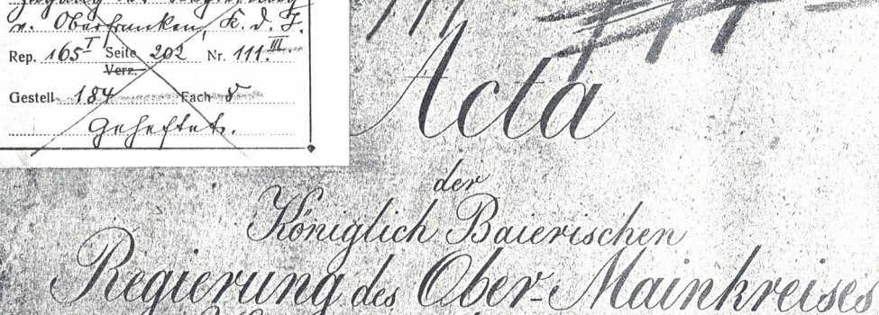 Das Bild zeigt ein altes Schriftstück zur Wiedererbauung des abgerannten Marktes Rehau.